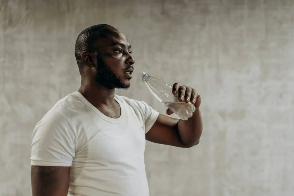 Man drinking water for avoiding handover
