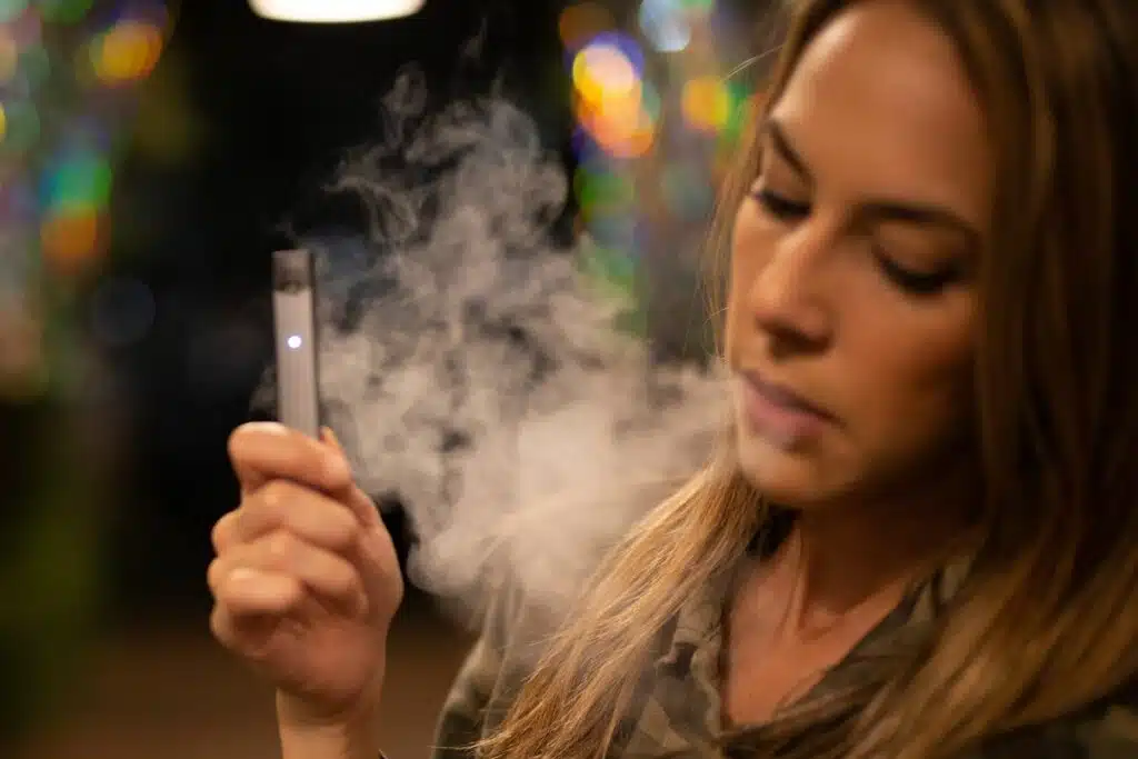 A girl smoking vape
