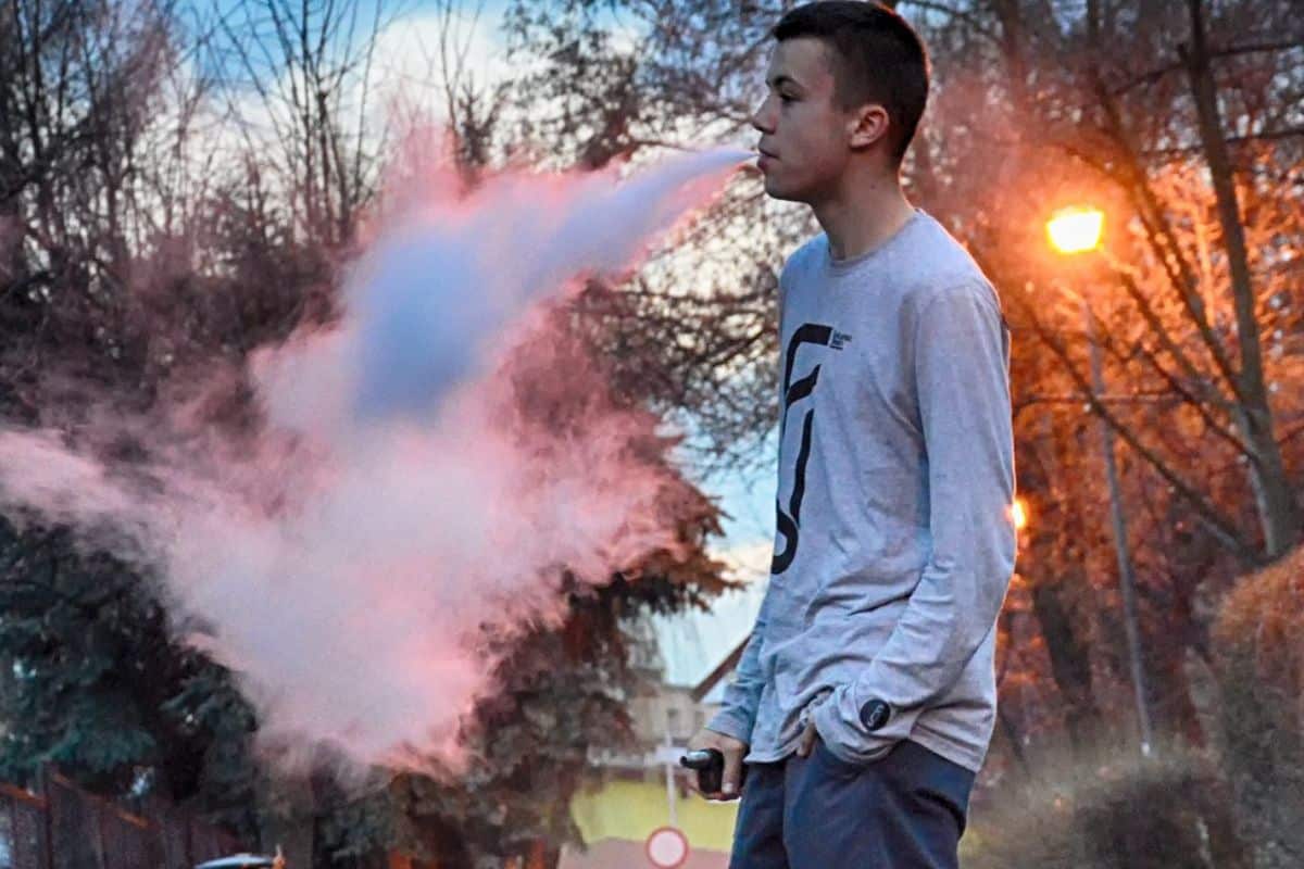 A guy vaping and having fun