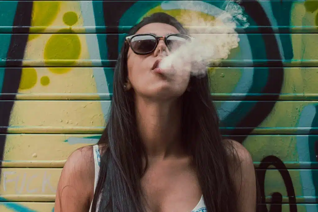 A lady smoking weed