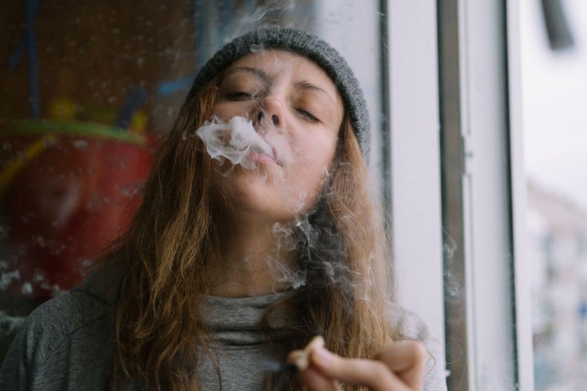 A girl with anxiety smoking weed