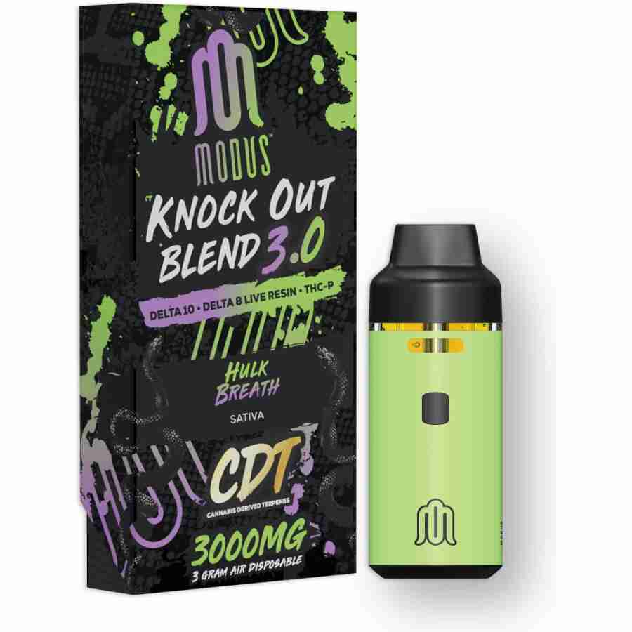 A green box with the Modus Knockout Blend Disposables (3.0g) e-liquid.