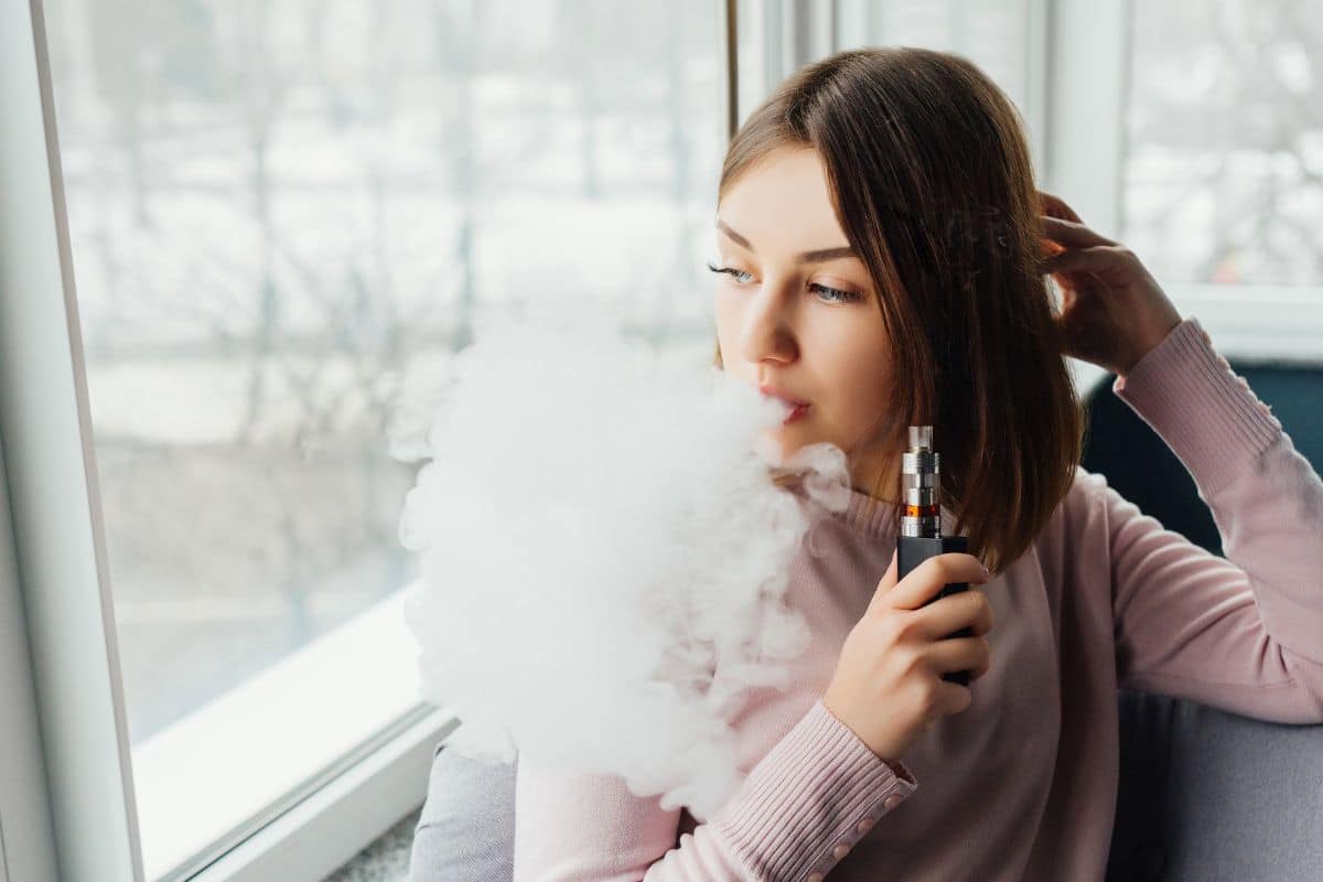 A lady vaping delta 9 to get rid of her anxiety