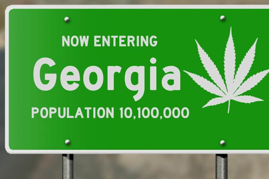 Georgia Bill Board with a marijuana leaf 