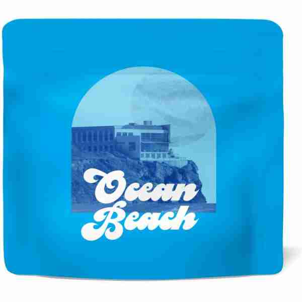 A blue pouch with the word Ocean Beach and 3.5g Cookies Premium THCA Flower on it.