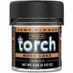 A jar of "torch" brand thc-a hemp flower labeled "boss cake indica" with a net weight of 3.5 grams becomes Flower Jars of "torch" brand thc-a