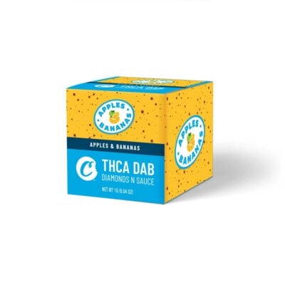 A yellow and blue rectangular container with the label "Apples & Bananas Cookies THCa Diamond Dabs." Net weight is 1.0 g (0.04 oz). The packaging features the brand's logo and fruit illustrations.