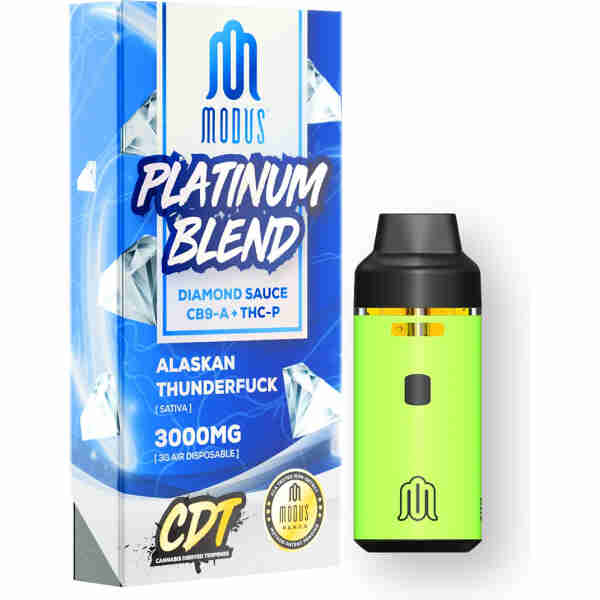 Packaging and a green vape pen of Modus Platinum Blend. The packaging text includes "Diamond Sauce," "CB9 + THC-P," and "Alaskan Thunderf* (Sativa), 3000MG, CDT, Air Disposable.