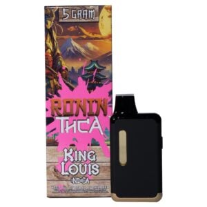 A Ronin Disposable Vapes 5g device sits next to a colorful box labeled "Ronin THCa King Louis Indica 5g." The packaging features Japanese-inspired artwork with a samurai, pagoda, and mountaintop at sunset.