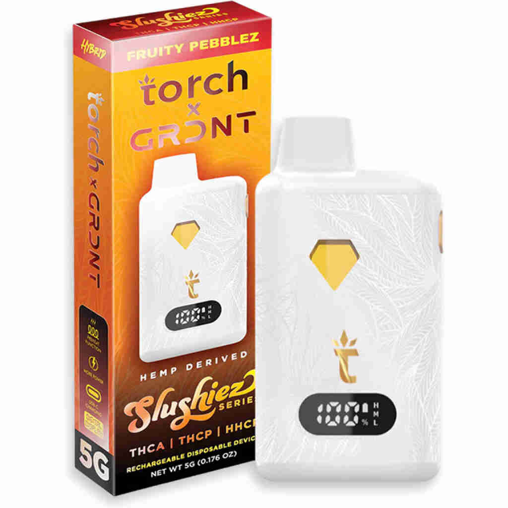 The Torch x GRNDT THCa Disposable vape pen package sports a Fruity Pebblez flavor. Its sleek white design, adorned with gold accents and leaf patterns, stands out. The box showcases essential product details and THC information for informed enjoyment.