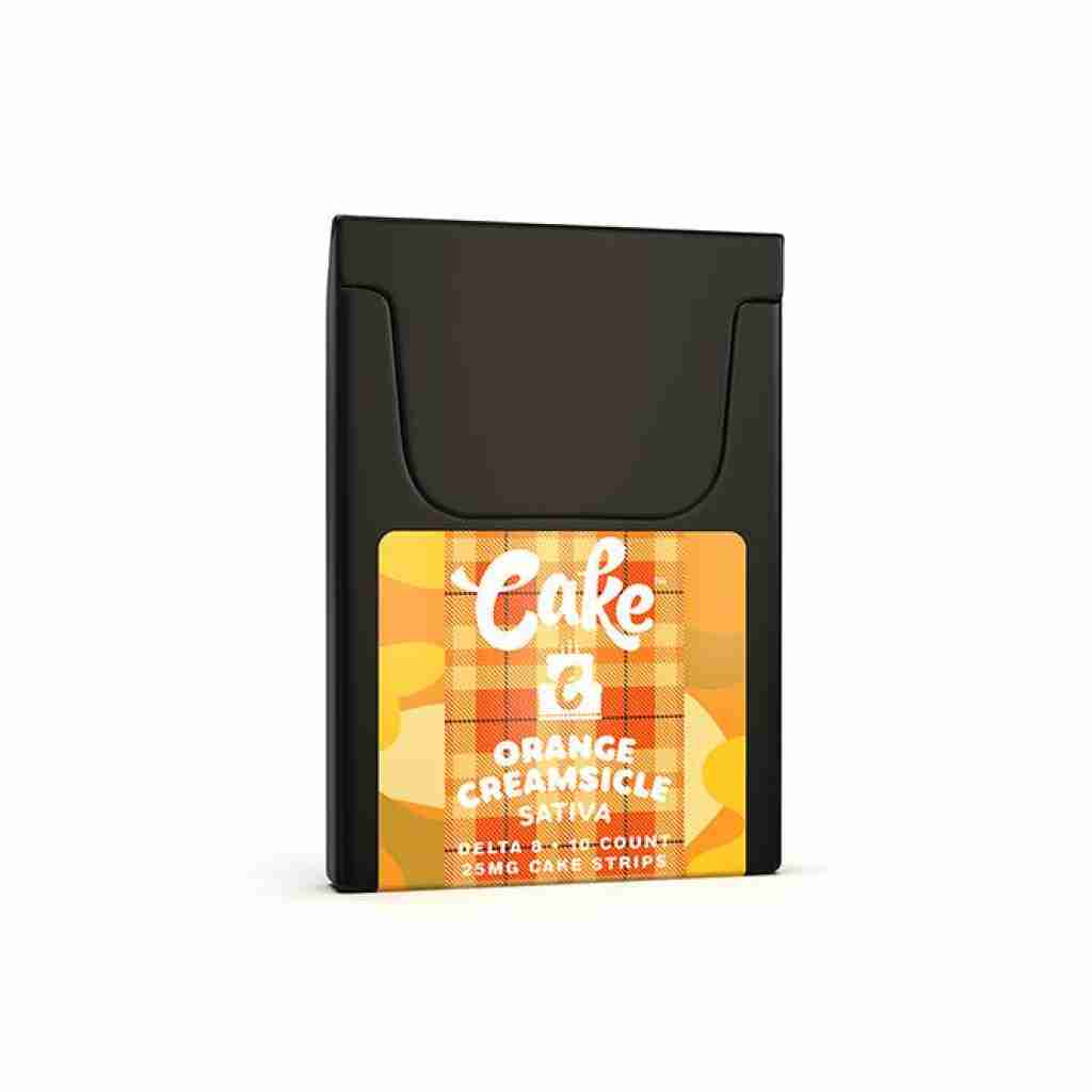 A sleek black package labeled Cake holds 25mg Orange Creamsicle Sativa Delta 8 THC Oral Strips. The vibrant label features a plaid pattern in orange and yellow with crisp white text, reminiscent of a refreshing Ginger Peach delight.