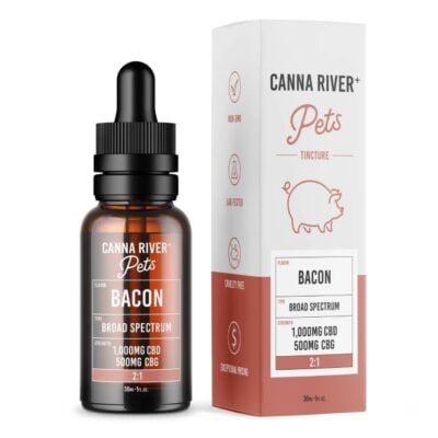 A bottle of Canna River Pets Bacon Broad Spectrum tincture is displayed next to its box. The label proudly shows 1000MG CBD, 500MG CBG. With a playful pig illustration, the box lists benefits like lab-tested quality and cruelty-free assurance, making it a top choice for CBD pet tincture enthusiasts.