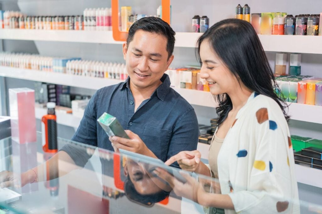 A lady buying Boutiq vape from an authorized store.