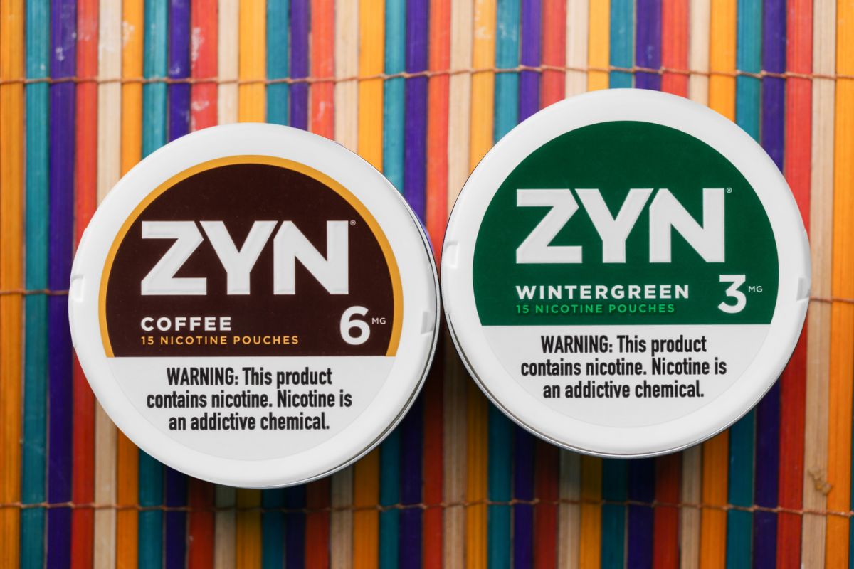 Two different strength of zyn nicotine pouches shown in the image