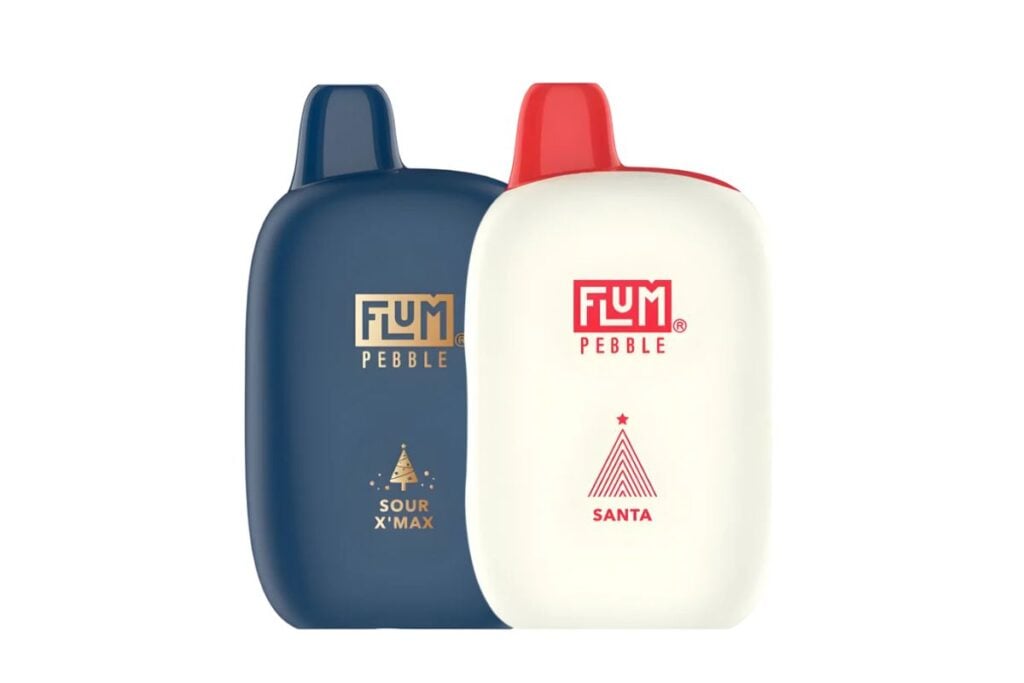 Two Flum Pebble vape devices are displayed. The left one is navy with Sour Xmax and a small tree design, sparking curiosity like asking, Does a Geek Bar Contain Weed? The right one is white with Santa and a red top, featuring a minimalistic tree design.