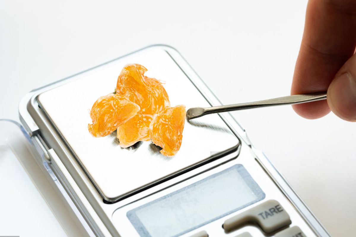 A collection of different dab particles placed together on a weighing scale